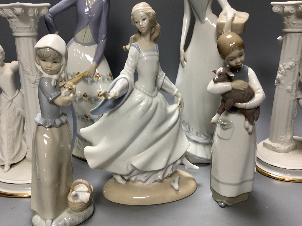 A quantity of Lladro, Nao and similar style figures